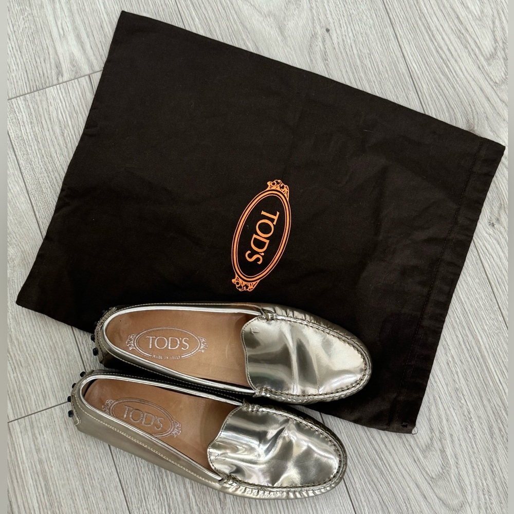 Authentic Tod’s Metallic Patent Leather Slip On Loafers (36.5 Euro)